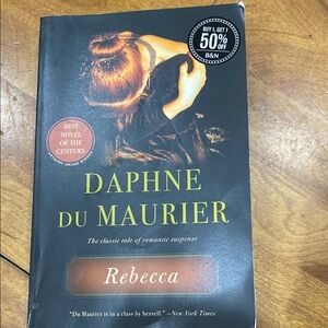 “Rebecca”, by Daphne DuMaurier, paperback book.